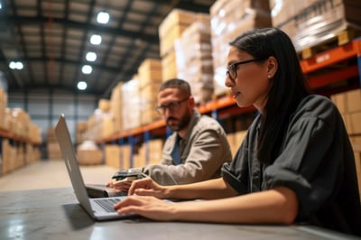 warehouse teams working on a computer