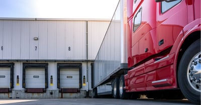 freight auditing cost with a red truck