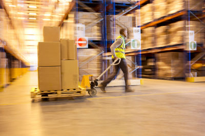 man rushing with pallet for shipping services